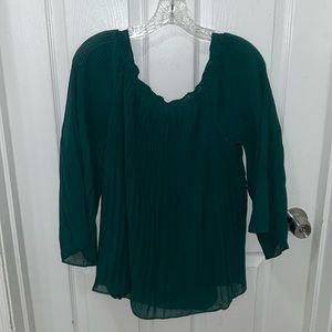 Woman’s green blouse